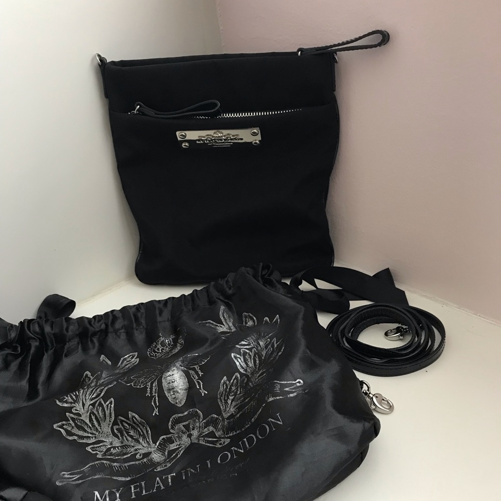 Black Brighton purse. “My Flat in London.”